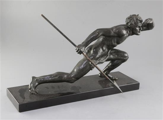 A 1930s French bronze figure of a hunter holding a spear, width 20in.